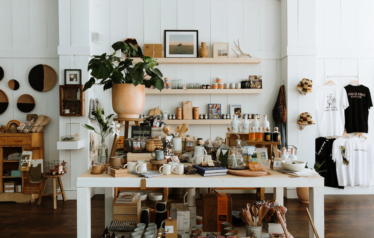 Retail shop styled with hats, bags and home goods