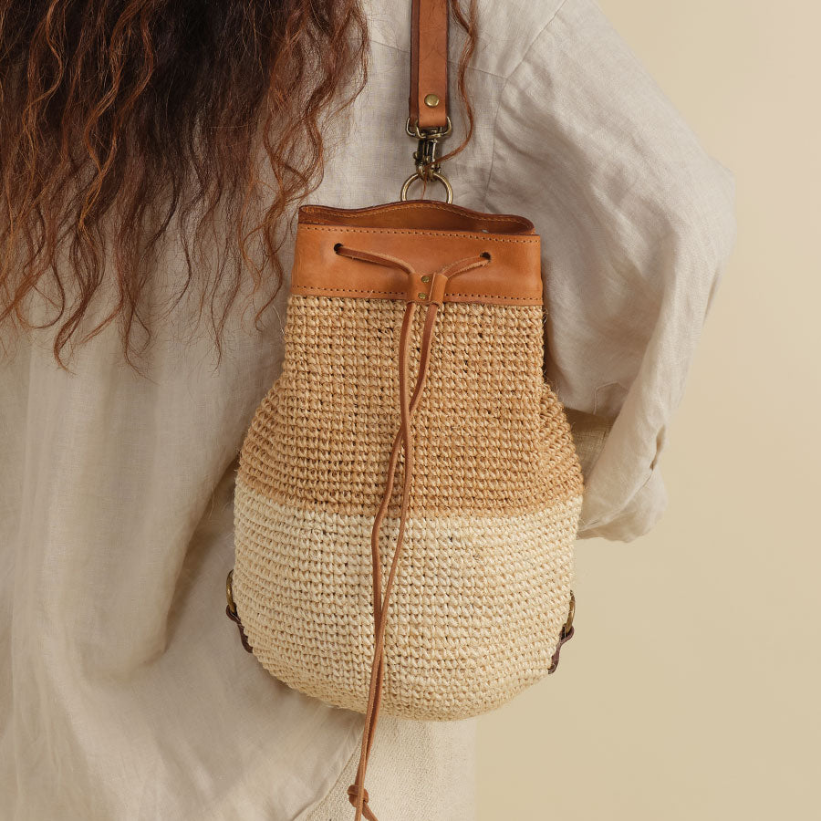 Made by Minga  Woven Water Bottle Holder with Leather Strap
